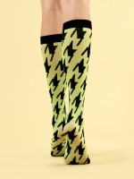 Fiore - 8 denier knee highs with oversized houndstooth pattern Fiore - 8 denier knee highs with oversized houndstooth pattern