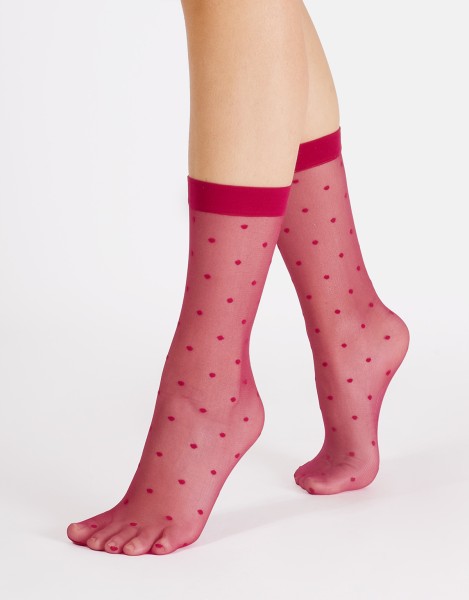 Cette - Chaussettes transparentes avec motif à pois